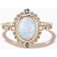 Bague de fiançailles en opale blanche taille ovale avec halo de topaze bleue