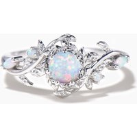 Bague de fiançailles en opale blanche taille ronde et or blanc
