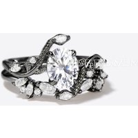 Bague de fiançailles serpent en or avec moissanite ovale