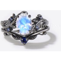Bague de fiançailles en or noir avec ensemble de mariage en pierre de lune naturelle
