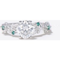 Bague de fiançailles en moissanite taille coussin avec accents d'émeraude