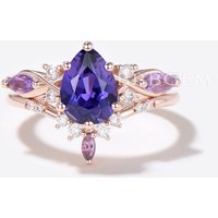 Bague de fiançailles en saphir violet en forme de poire avec anneau torsadé