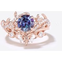 Bague de fiançailles florale en Alexandrite ronde en or rose