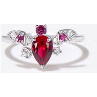 Bague de fiançailles en rubis en forme de poire avec accents de diamant