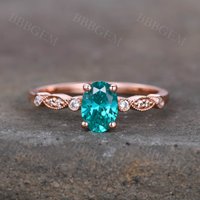 Bague de Promesse en Grenat Taillé en Ovale avec Bande en Or Rose