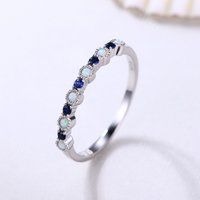 Bague de mariage délicate en opale et saphir taille ronde en or rose