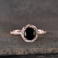 Bague de fiançailles en onyx noir et halo de diamants