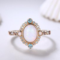 Bague de fiançailles en opale et topaze bleue de Londres en or rose — Bagues de fiançailles