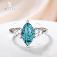 Bague de fiançailles en turquoise marquise avec trois diamants