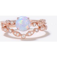Bague de fiançailles en opale florale solitaire en or rose