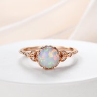 Bague de fiançailles en opale solitaire florale en or rose