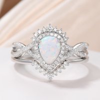 Bague de fiançailles vintage en opale et diamant en or blanc
