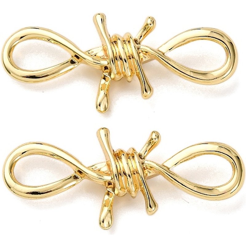 Pendentif en alliage en forme de nœud avec plaquage doré — Breloques et pendentifs
