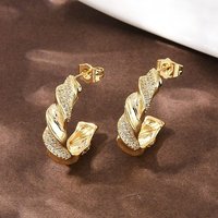 Boucles d'oreilles à clou torsadées en zircon cubique clair micro pavé en laiton — Bijoux fantaisie