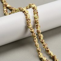 Synthetic Turquoise Skull Beads Strands, Light Yellow, 47pcs