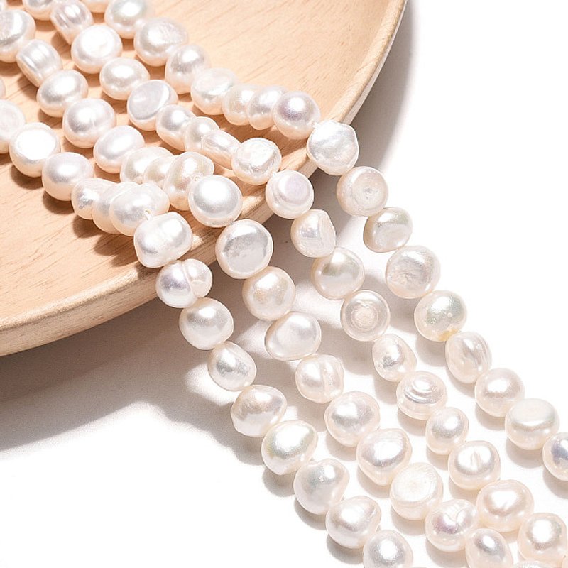 Brins de perles de culture d'eau douce naturelles, blanc crémeux — Perles à bijoux