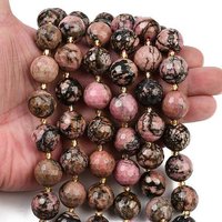 Fils de perles de rhodonite naturelle, facettées rondes avec perles de semence