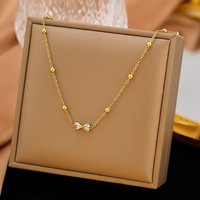 Collier Pendentif en Acier Inoxydable 304 avec Nœud pour Femmes, Doré — Collier pendentif