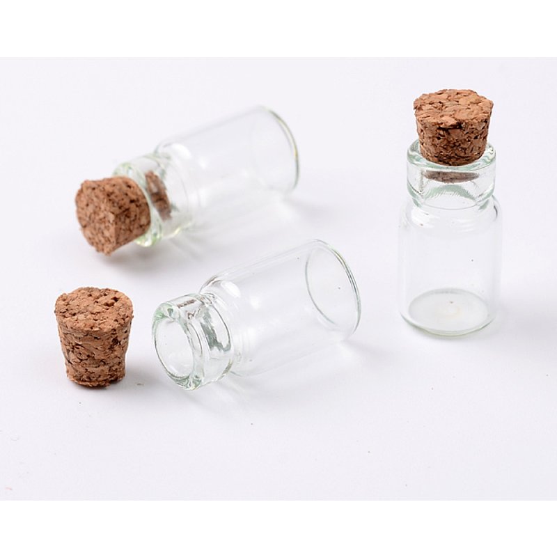 Bouteilles en verre avec bouchon en liège pour perles et souhaits — Rangement et présentation