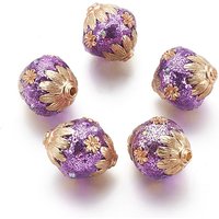 Perles ovales faites à la main d'Indonésie avec motif floral en doré et violet