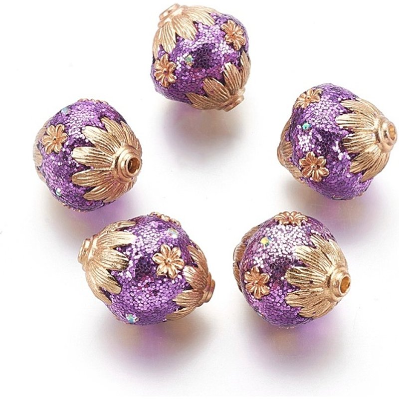 Perles ovales faites à la main d'Indonésie avec motif floral en doré et violet — Perles à bijoux