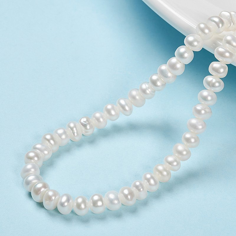 Brins de perles de culture d'eau douce naturelles, rondelles, blanches — Perles à bijoux