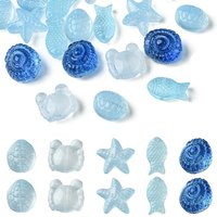 Ensemble de 25 perles en verre transparent sur le thème marin, formes variées — Perles à bijoux