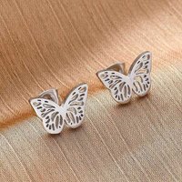 Boucles d'oreilles studs en acier inoxydable 304 en forme de papillon creux — Bijoux fantaisie