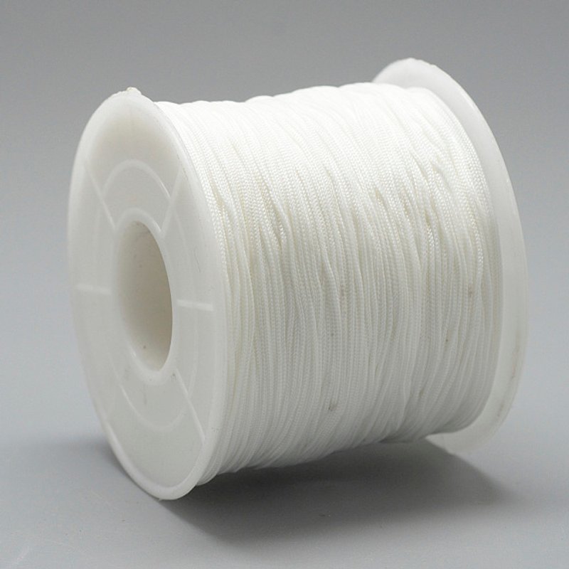 Polyester Cords, White, 0.5-0.6mm, 131.23-142.16 yards/roll — Chains, Wire & Cord