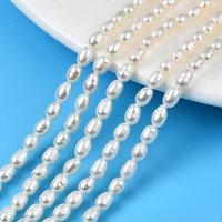 Fils de perles de culture d'eau douce naturelles, forme de riz, couleur coquillage — Perles à bijoux