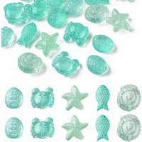 Ensemble de 25 perles en verre transparent sur le thème marin, formes variées — Perles à bijoux