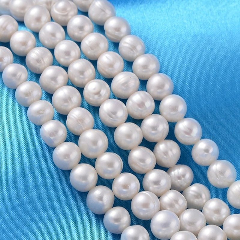 Brins de perles de culture d'eau douce naturelles, blanc crémeux, 7-8mm — Perles à bijoux