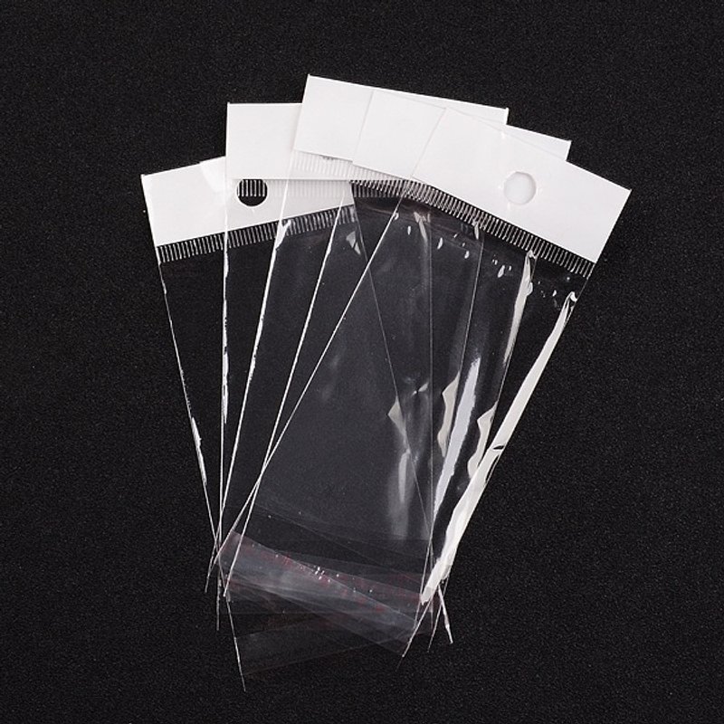 Sacs en Cellophane Pearl avec Fermeture Auto-Adhésive et Trou de Suspension — Rangement et présentation