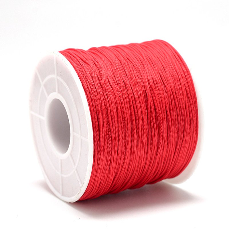 Cordes en polyester rouges, 0.5-0.6mm, 131.23-142.16 verges par rouleau — Chaînes, fils et cordons